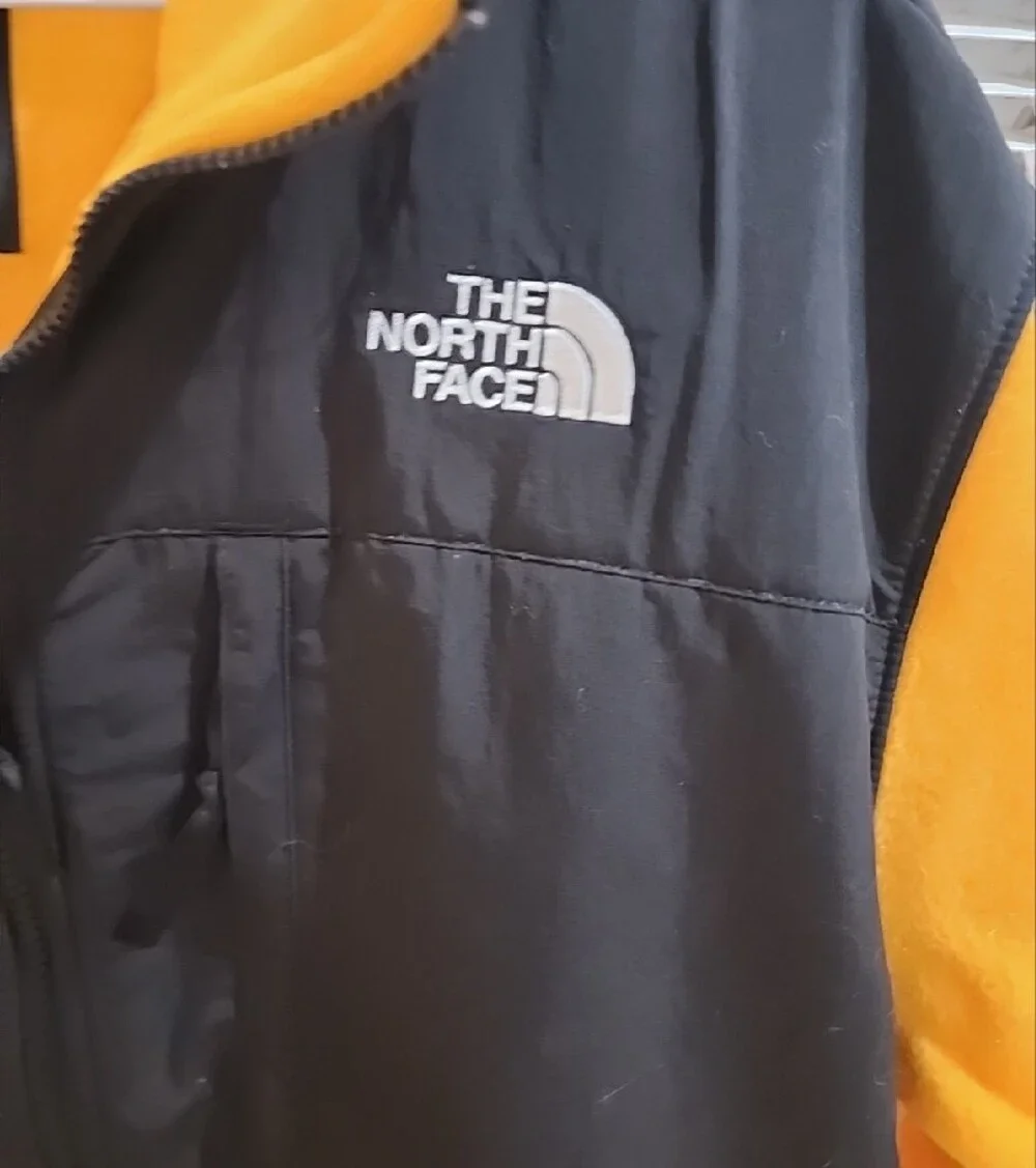 The North Face Men’s Summit Gold and Black Denali Fleece Jacket